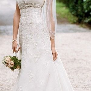 NWT.  David’s bridal organza trumpet gown